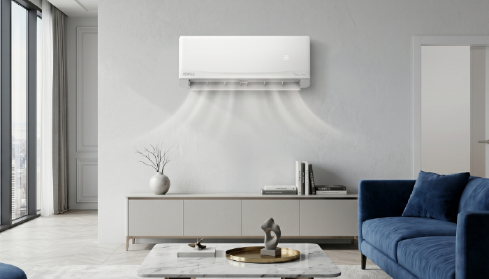 Blog — convencional vs inverter Mini split inverter ADINA en sala moderna
